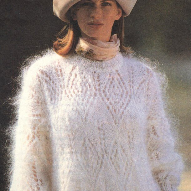 Женский пуловер с ажурным узором 